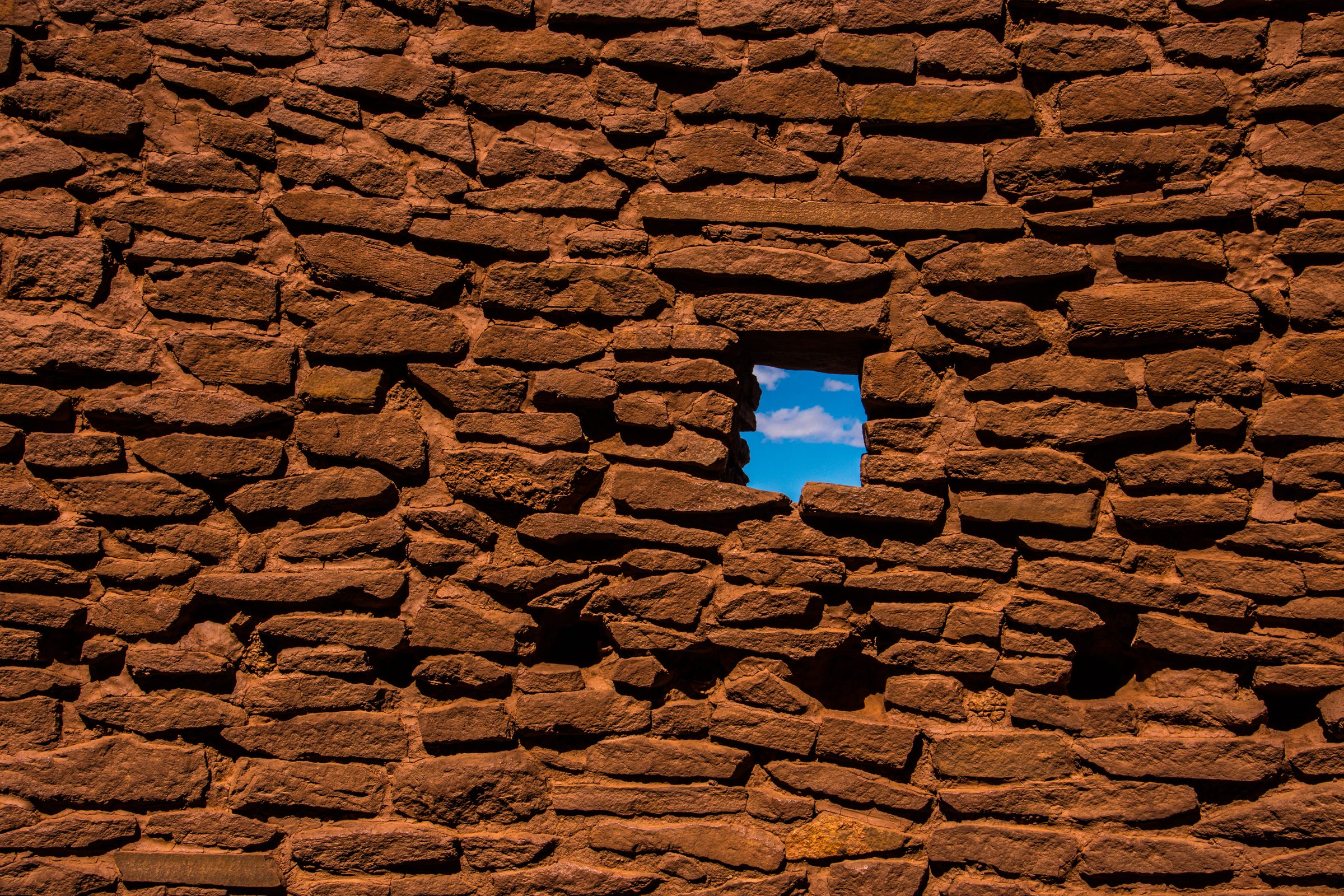 Adobe wall with sky
